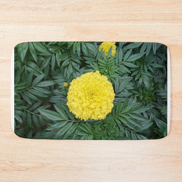 Item preview, Yellow marigold flower blooming in garden designed and sold by ShopThousand.