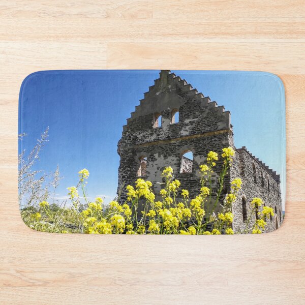 Item preview, Ruins of an old castle Yellow rapeseed plants in Sweden designed and sold by Tanja Dianova.