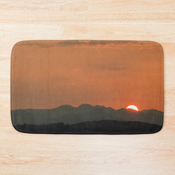 Item preview, An orange setting sun behind Crinkle Crags in the Lake District National Park, Cumbria.  designed and sold by Cameranick.