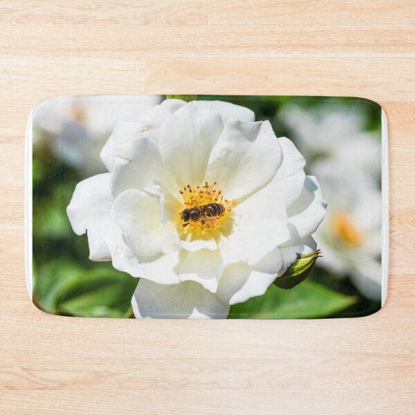Item preview, Close up on a bee on a white flower designed and sold by moroccandreamer.