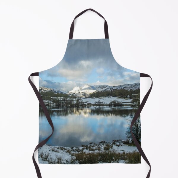 Item preview, Loughrigg Tarn in the Lake District with Winter Snow and beautiful cloud reflections. In the distance are the Langdale Pikes. designed and sold by Cameranick.