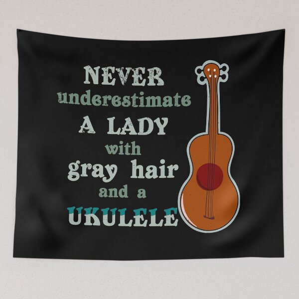 Item preview, Lady with gray hair and ukulele | Never underestimate | Music humor for uke lovers designed and sold by DeliriousSteve.