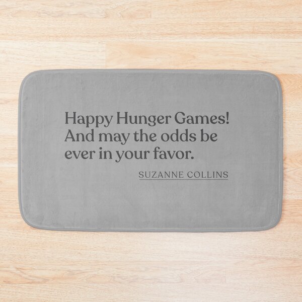 Item preview, Suzanne Collins - Happy Hunger Games! And may the odds be ever in your favor. designed and sold by BookQuoteMerch.