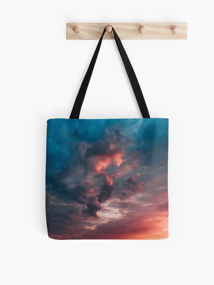 Thumbnail 1 of 2, Tote Bag, Dramatic multicoloured sky designed and sold by Rakos-Merch.