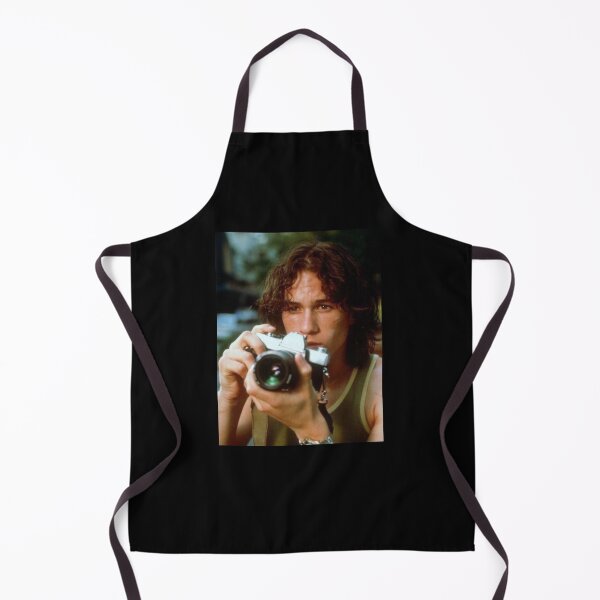 Item preview, heath ledger with vintage camera black background designed and sold by molithesecond.