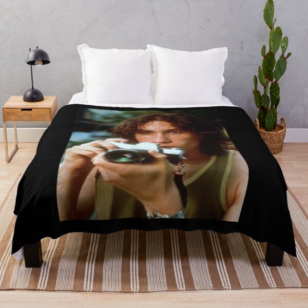 Item preview, heath ledger with vintage camera black background designed and sold by molithesecond.