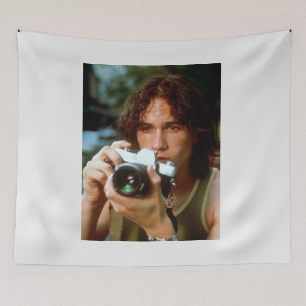 Item preview, heath ledger with vintage camera white background designed and sold by molithesecond.