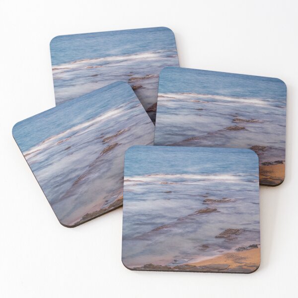 Waves crashing over a rocky beach Coasters (Set of 4)