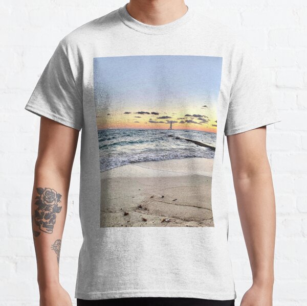 A sail boat at the beach Classic T-Shirt