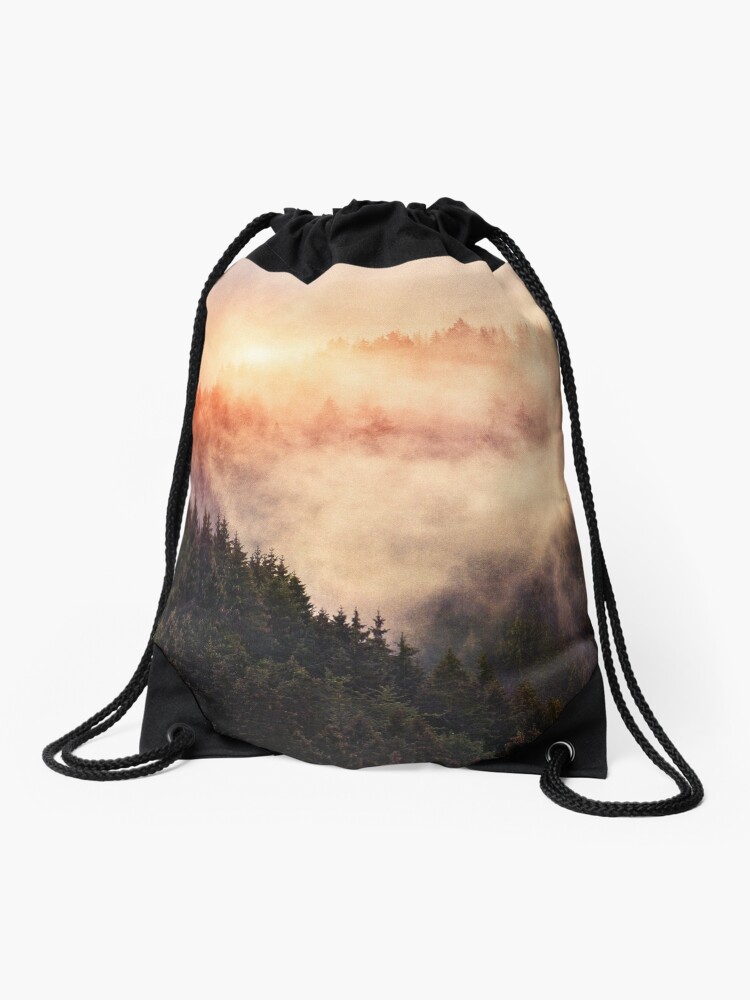 Thumbnail 1 of 3, Drawstring Bag, In My Other World // Sunrise In A Romantic Misty Foggy Fairytale Wilderness Forest With Trees Covered In Fog And Sunlight designed and sold by Tordis Kayma.