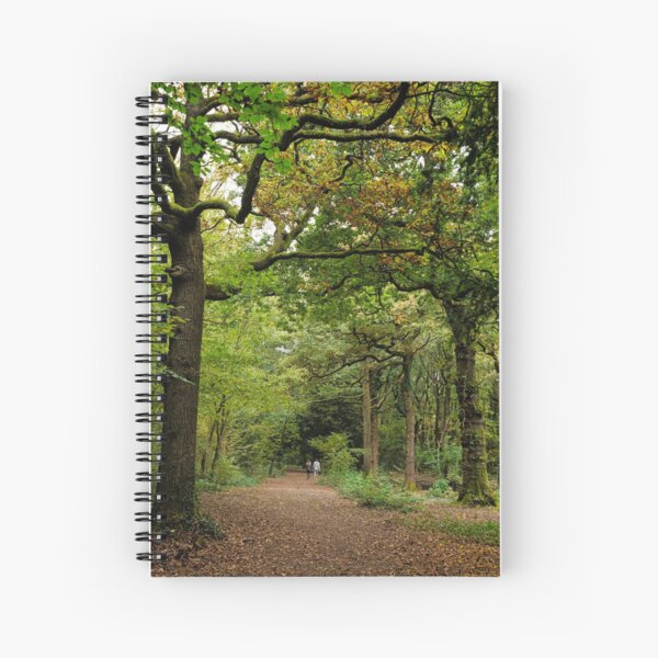 Young couple walk in the woods Spiral Notebook