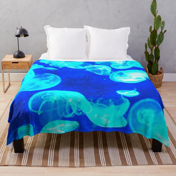 Item preview, Bright Blue Glowing Jellyfish Deep Blue Sea designed and sold by StayCuztom.