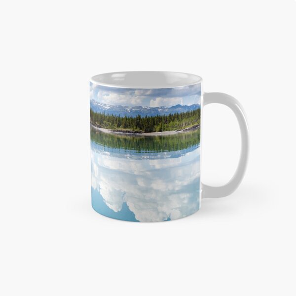 Item preview, Yukon wilderness cloudscape reflected on calm lake designed and sold by ImagoBorealis.