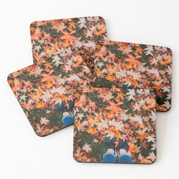 Item preview, A pair of cute feet covered by orange autumn leaves designed and sold by Carmen Jost.