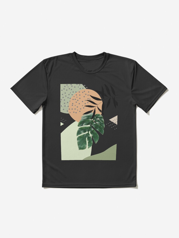 Imagen 2 de 7, Camiseta deportiva con la obra Arte abstracto tropical Monstera con formas suaves en cálidos tonos terrosos con hojas verdes I, diseñada y vendida por AbstractTrace.