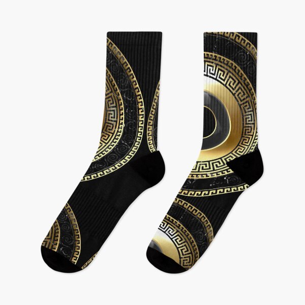 Aperçu de l'œuvre Mati Evil Eye Gold Greek Key motifs noirs créée et vendue par Yiorgos Designs.