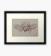 Skulls and guns Framed Print