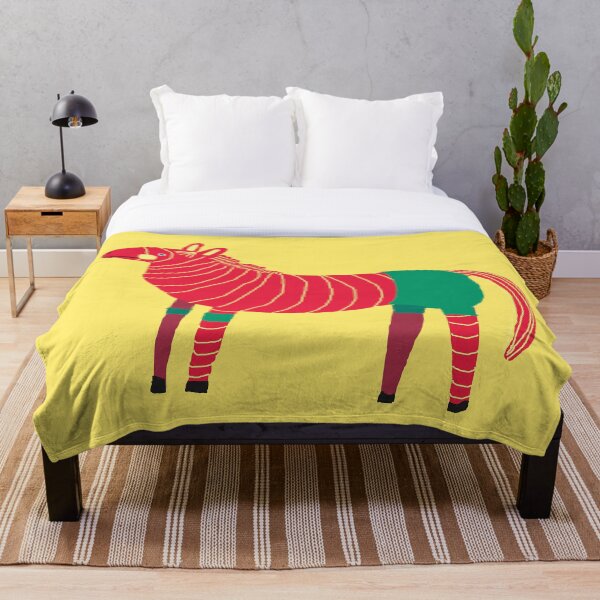 A STRANGE PINK HORSE Throw Blanket