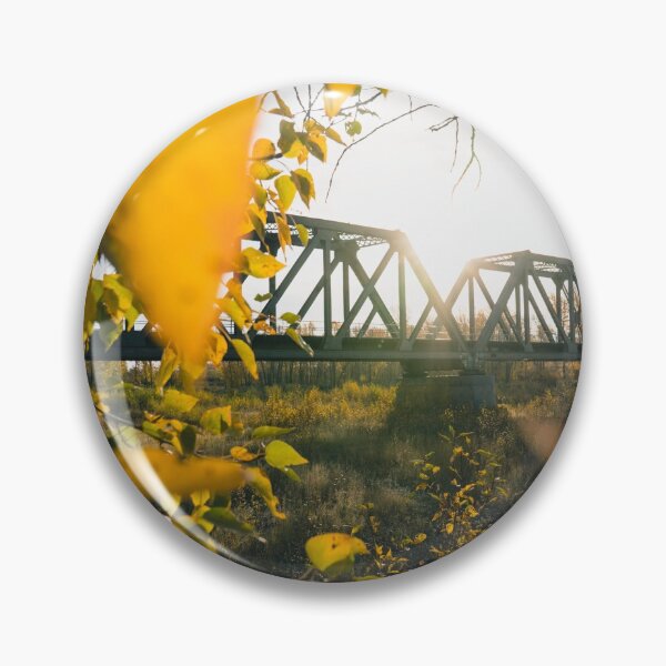 Item preview, Autumn Leaves and Sunrise Over Steel Truss Bridge designed and sold by JonesyDave.