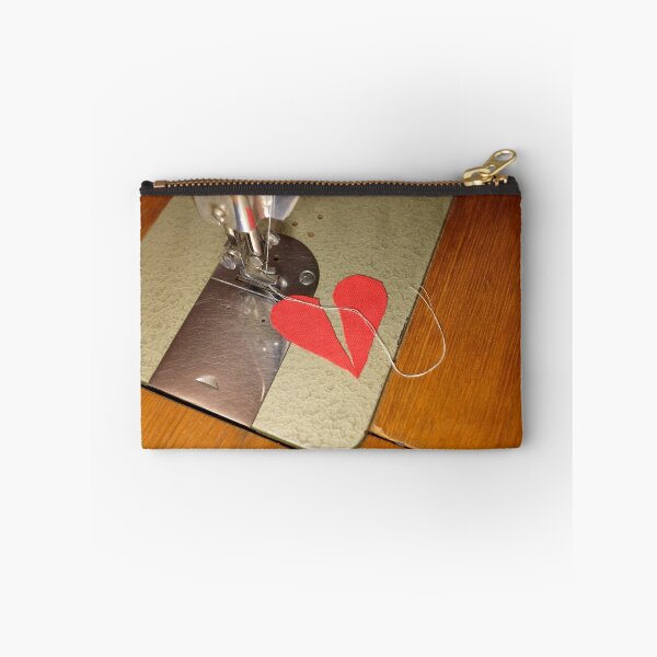 Item preview, tailor try to sew two halves of broken heart together designed and sold by Claraveritas.