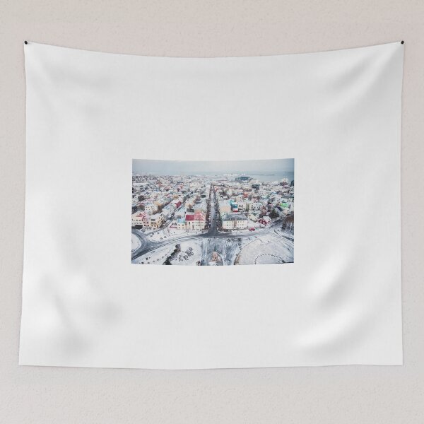 Item preview, View over Reykjavik from the clock tower, just after sunrise on a wintry day designed and sold by Victoria Ashman.