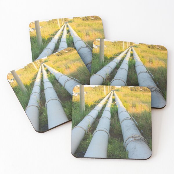 Item preview, three long parallel large diameter steel pipes of outdoor pipeline in the countryside are piping for aqueducts on a tuscan field at sunset designed and sold by alessiapenny.