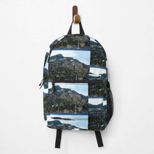 Item preview, View in Amalfi coast at a huge mountain with rocky parts, greenery and buildings with a white boat underneath designed and sold by Kristina Drozd.