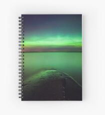 Northern lights glow over lake Spiral Notebook