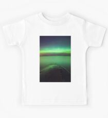 Northern lights glow over lake Kids Tee