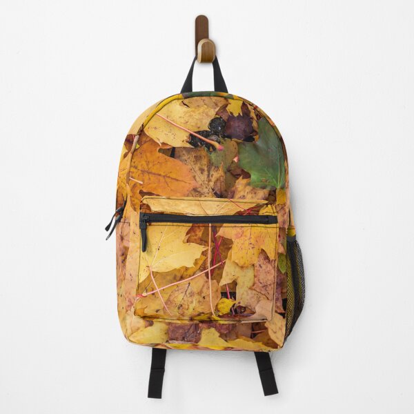 Item preview, One green leaf among orange yellow maple leaves designed and sold by lena-maximova.