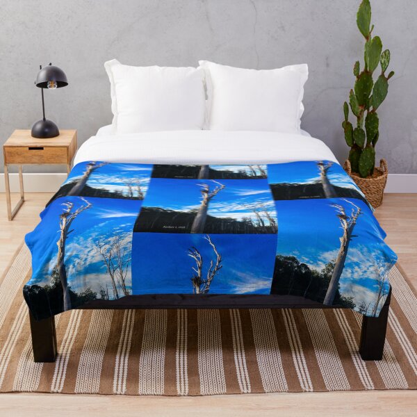 Eagles nest at sunrise Throw Blanket