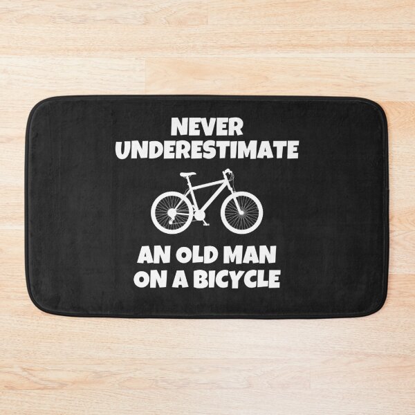 Item preview, Never Underestimate an old man on a bicycle designed and sold by MohitJain1109.