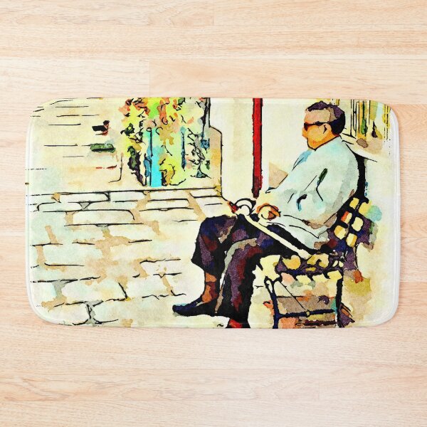 Item preview, Borrello: senior citizen sitting on a bench outside the home designed and sold by Giuseppe Cocco.