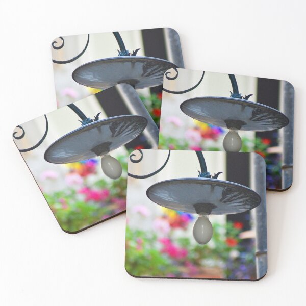 Item preview, An old black light hanging over colourful flowers. designed and sold by EAnneH.