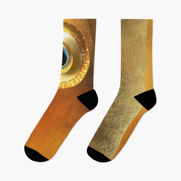 Aperçu de l'œuvre Mati Evil Eye Clé grecque or foncé et clair créée et vendue par Yiorgos Designs.