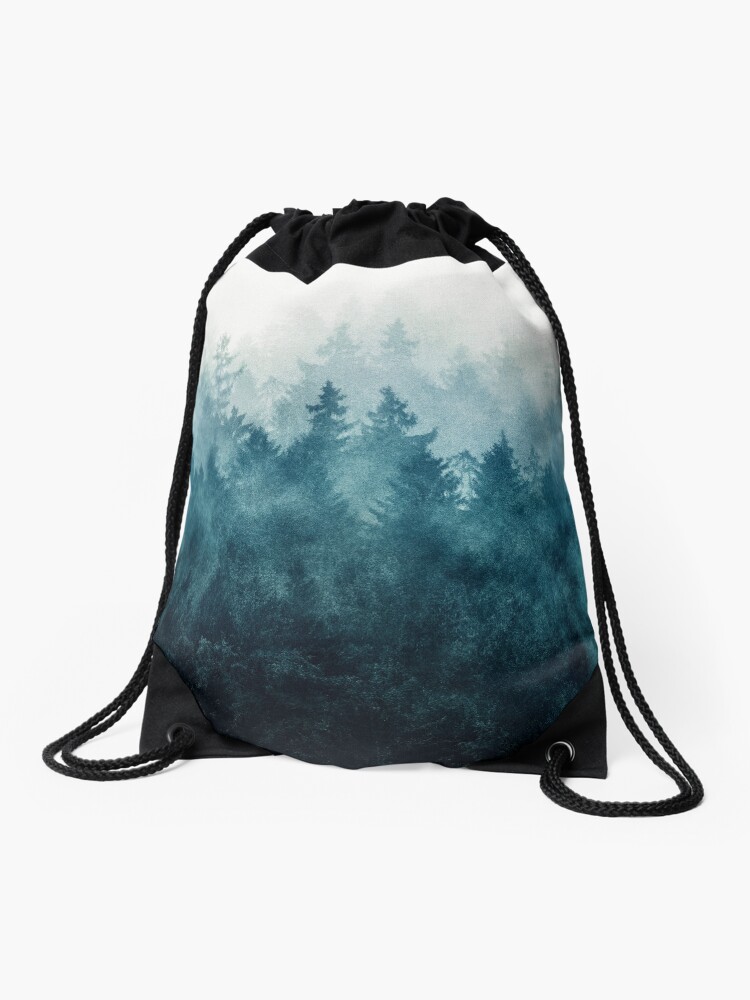 Thumbnail 1 of 3, Drawstring Bag, The Heart Of My Heart // So Far From Home Of A Misty Foggy Wilderness Forest Covered In Blue Magic Fog designed and sold by Tordis Kayma.