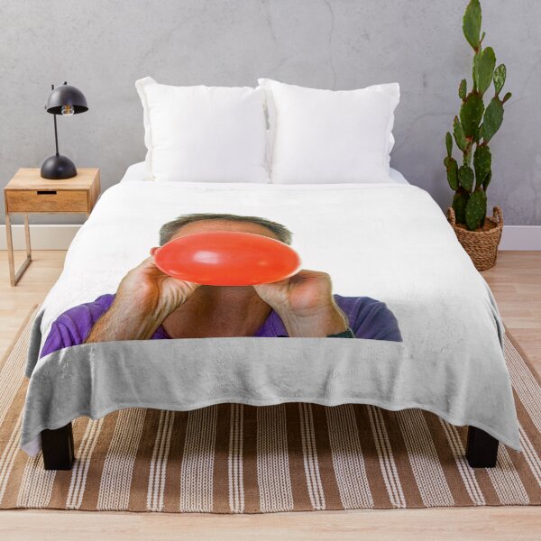 Item preview, Man blowing red balloon designed and sold by Photopat.