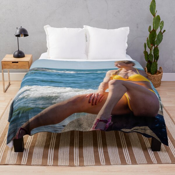 Item preview, Beautiful fitness girl on the rocks at the seashore posing designed and sold by Ninnudez.