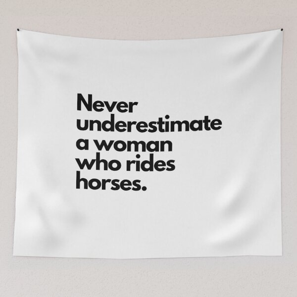 Item preview, Never Underestimate a Woman Who Rides Horses designed and sold by HorseLifeCo.