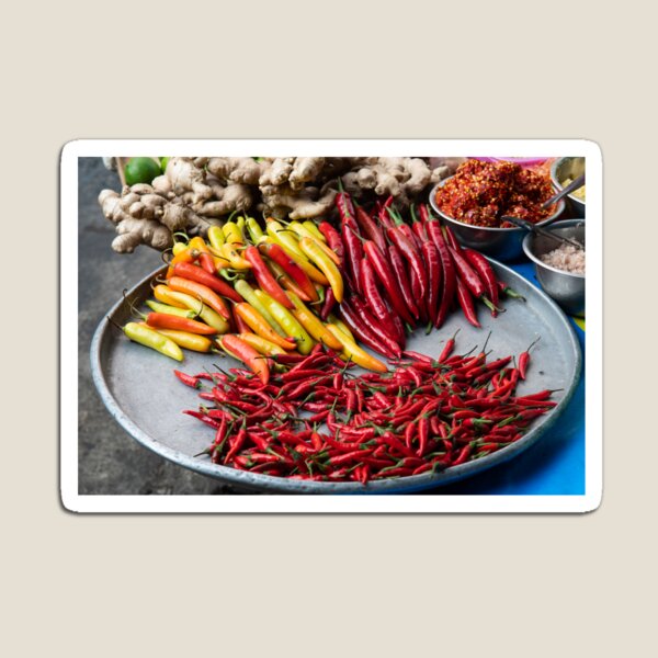 Item preview, Different types of peppers on plate at market in Vietnam designed and sold by krisgreenwood.