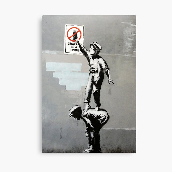 Graffiti Is A Crime By Banksy Canvas Print