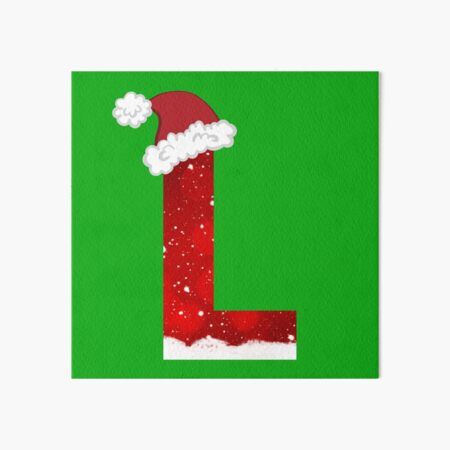 Christmas letter L with Santa Claus cap. Stock Photo by ©vladvitek 33361245