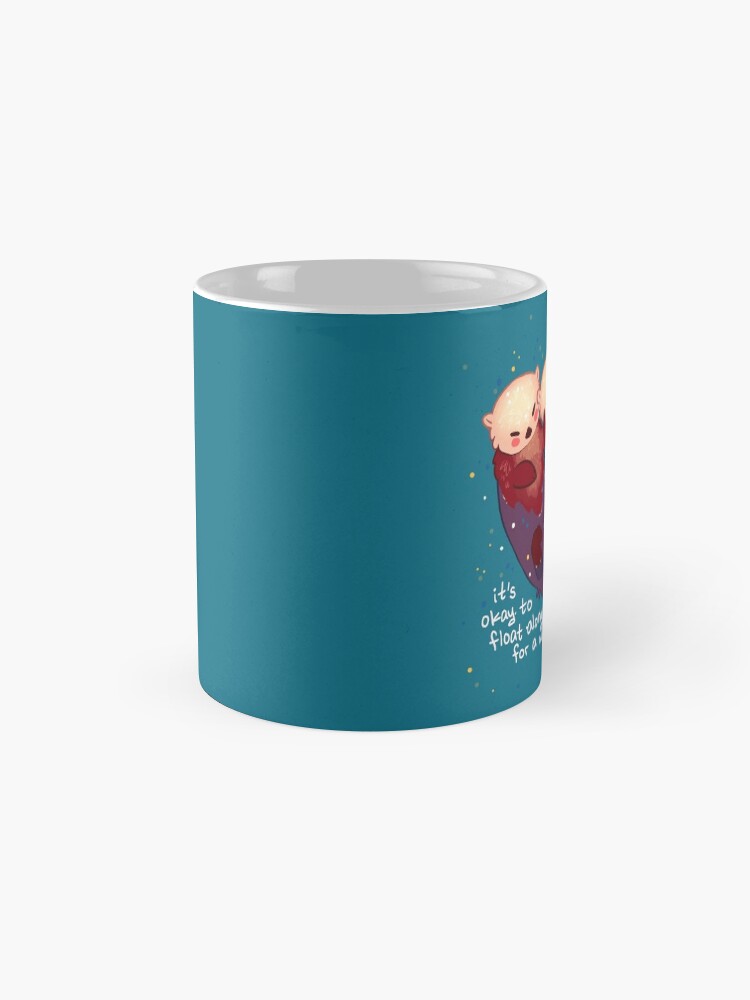 Alternate view of "It's Okay to Float Along For a While" Hand Holding Otters Coffee Mug