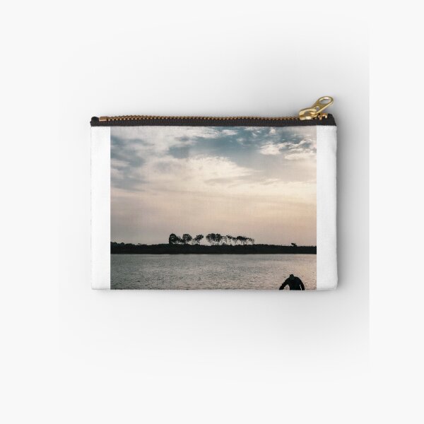 Item preview, An old man in sunset darkness moment where the ocean meet the valley with Eucalyptus trees designed and sold by OMCreative.