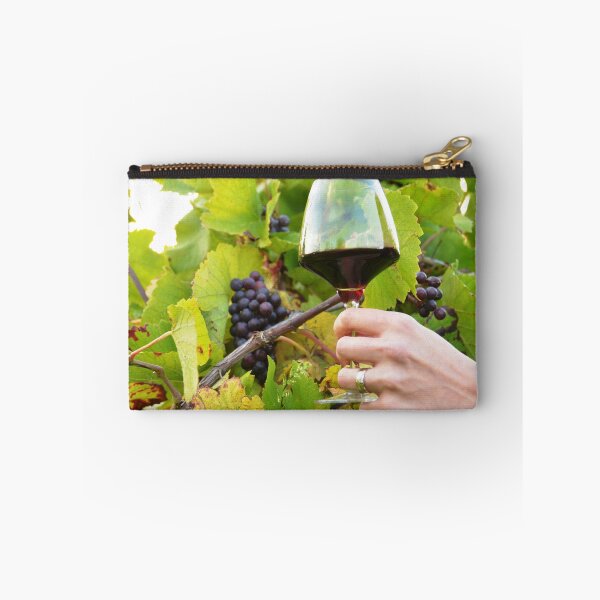 Item preview, Glass of red wine in the vineyard designed and sold by wineandwords.