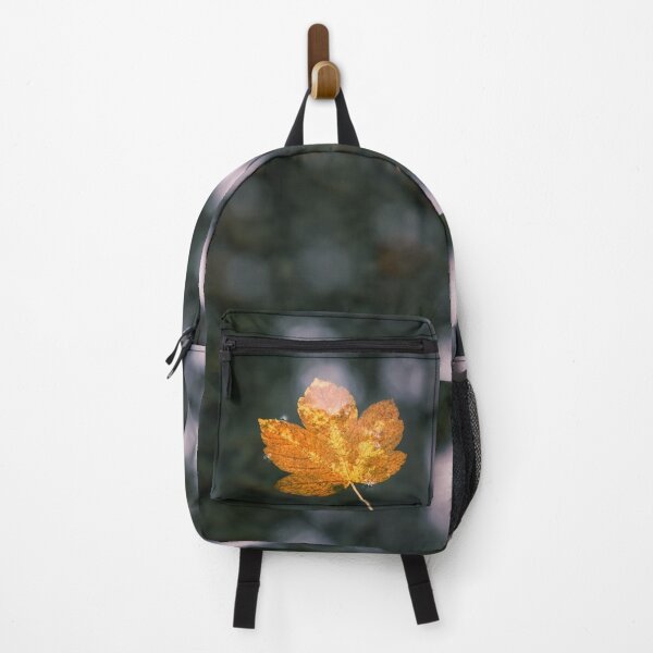 Item preview, Single golden autumn leaf on water surface. designed and sold by EverydayHermit.