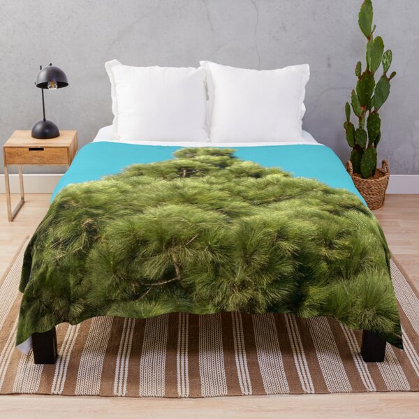 Item preview, isolated green pine tree with blue sky background designed and sold by Mrvell.