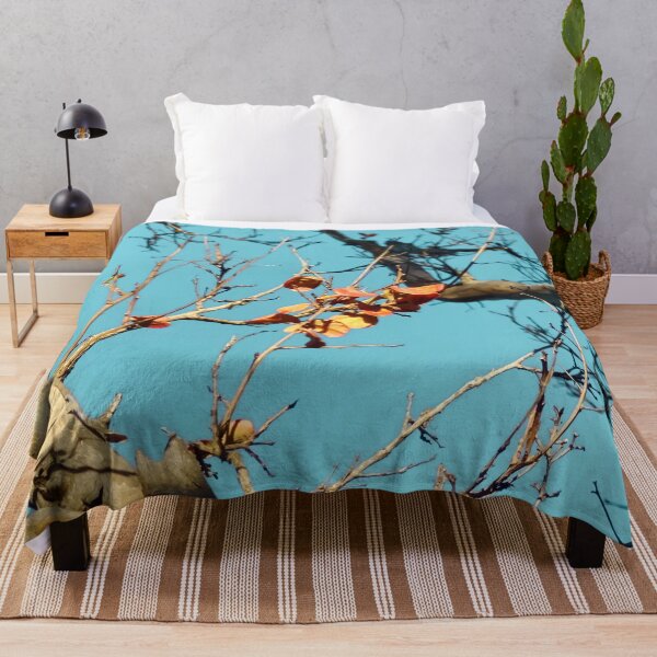 Item preview, Tree branch with orange autumn leaves and blue sky designed and sold by Mrvell.