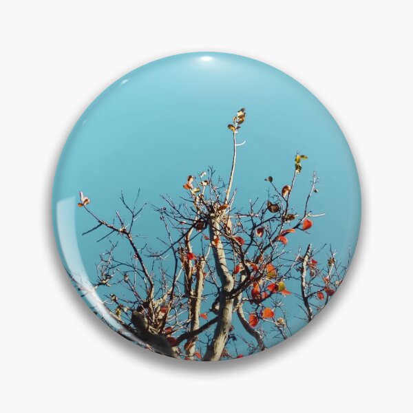 Item preview, Tree branch and orange autumn leaves with blue sky designed and sold by Mrvell.
