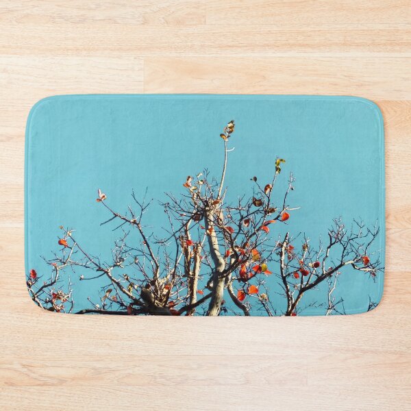 Item preview, Tree branch and orange autumn leaves with blue sky designed and sold by Mrvell.